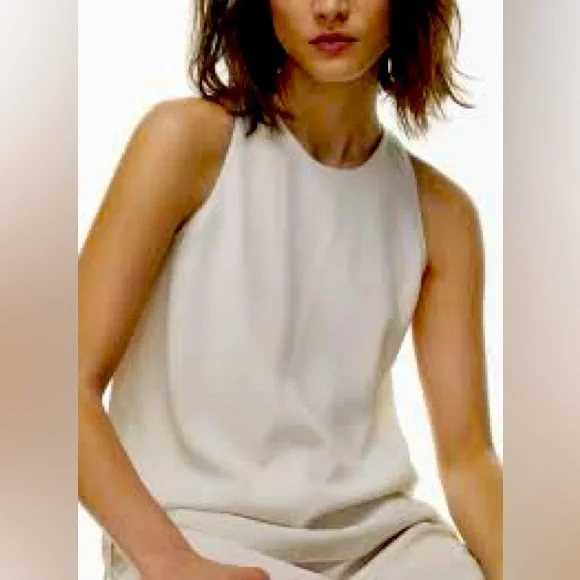 Sleeveless white blouse.  Chiffon Layered bottom and longer back. Large - Picture 2 of 13